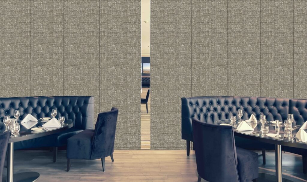 Textured panel blinds behind upholstered booth seating