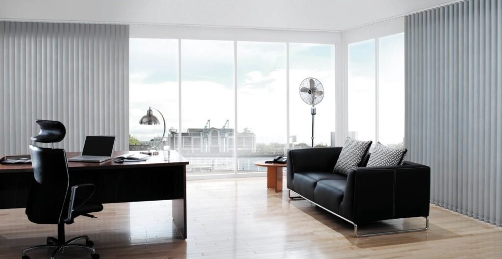 Vertical blinds running the length of an executive office